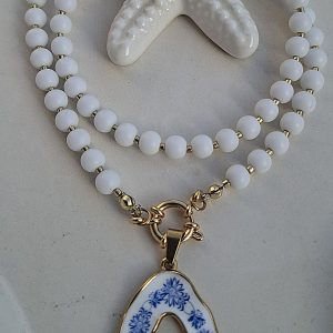 Bijelo - plava kombinacija čelika i emajla s mat perlama